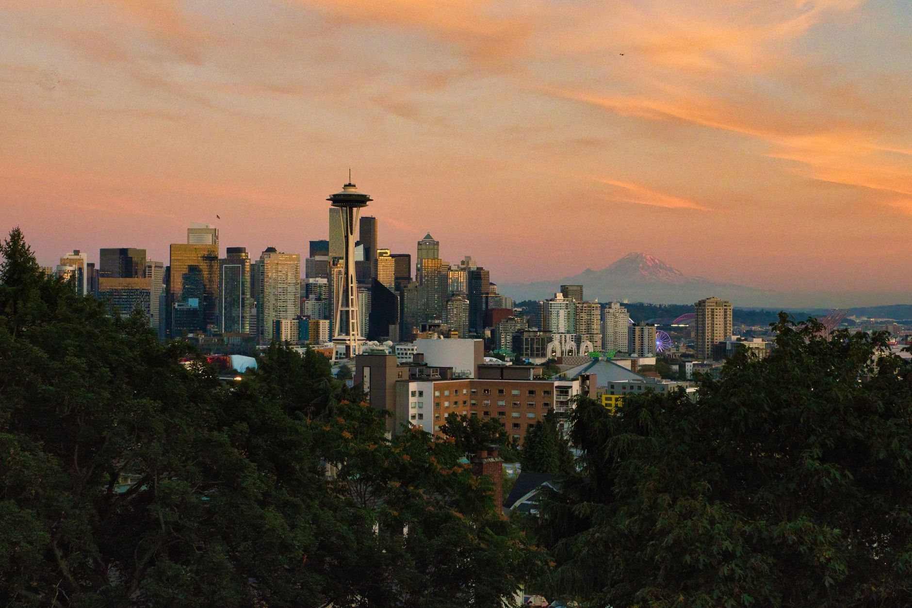 Seattle skyline at sunset with the Space Needle and Mount Rainier